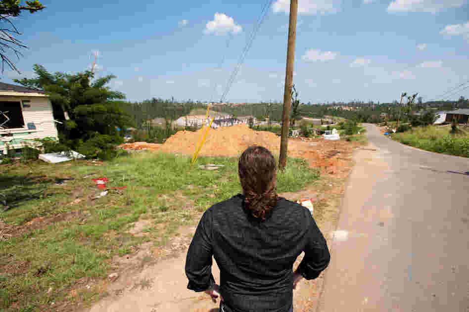 My Morning Jacket drummer Patrick Hallahan stands at the highest point of the storm's path through Tuscaloosa. This view did not exist before the storm, which felled more than 5,000 trees in Tuscaloosa County.We passed by three elementary schools rendered unusable, whose students have been relocated. That sight particularly affected Hallahan. "My wife has been a teacher for years," he sa...