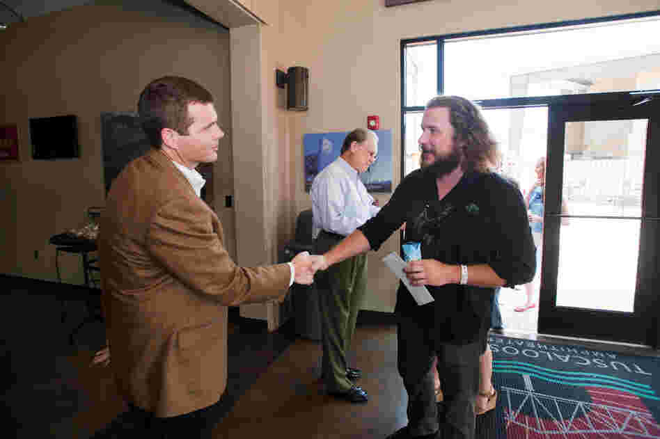 Tuscaloosa Mayor Walt Maddox greets James and the other artists backstage at the Tuscaloosa Amphitheater before the show.After the storm, Maddox enlisted a large task force of citizens to come up with an approach to rebuilding. Music is part of his plan, along with green building practices, pedestrian walkways and more open space. "Three years ago, the city decided to build this amphithe...