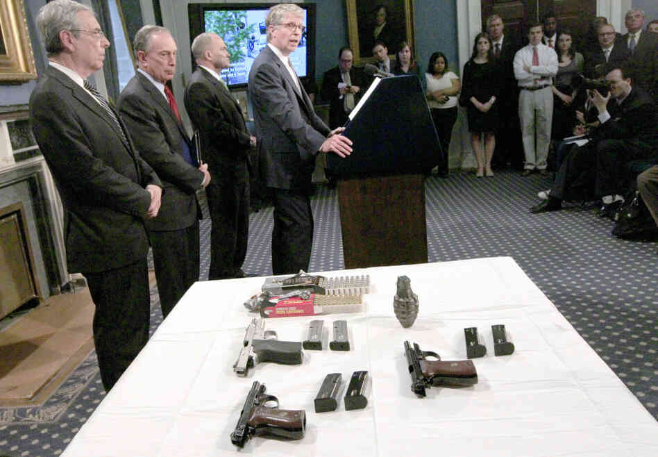 NYPD Deputy Commissioner for Intelligence David Cohen (far left) stands with other city officials to announce a foiled terrorist plot against a New York synagogue on May 12.