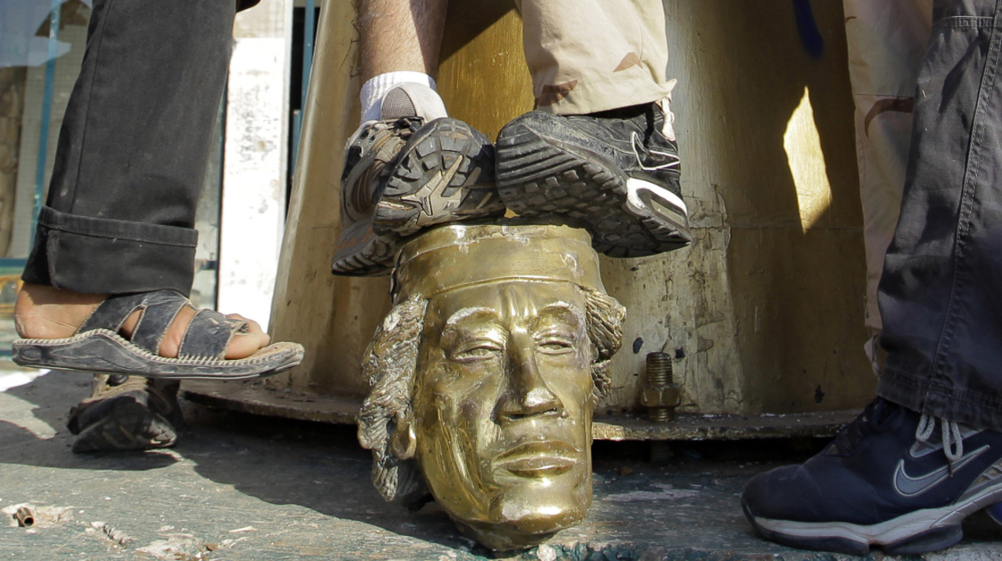Some Libyans used their feet — in a grave insult — to show their contempt for Moammar Gadhafi during the looting of his compound in Tripoli on Tuesday.
