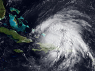 Here she comes. A National Oceanic and Atmospheric Administration satellite photo of Hurricane Irene, taken Tuesday (Aug. 23, 2011). Cuba and Florida are to the left. Here she comes. A National Oceanic and Atmospheric Administration satellite photo of Hurricane Irene, taken Tuesday (Aug. 23, 2011). Cuba and Florida are to the left.