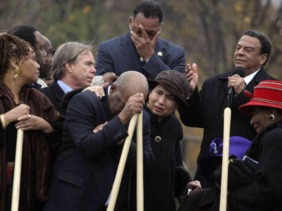 Andrew Young (top right) speaks about the significance of the Rev. Martin Luther King Jr. at the groundbreaking for the memorial in Washington, D.C., on Nov. 13, 2006. Also present are other King lieutenants, including the Rev. Jesse Jackson (top center) and Georgia Rep. John Lewis (leaning on shovel).