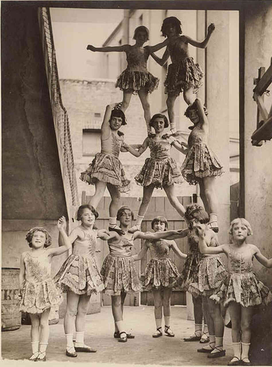 Good production support is like the third girl from the left at the bottom of this human pyramid: rock-solid, handled with aplomb and grace (Look at her feet!)