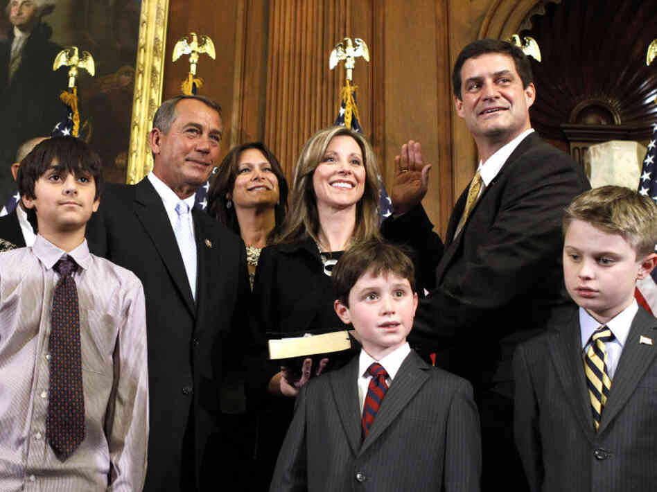Freshman Rep. Chip Cravaack (R-MN) receives the House oath from House Speaker John Boehner during a mock swearing-in ceremony on Capitol Hill in January.