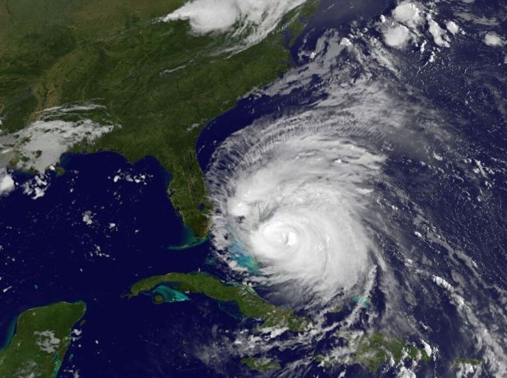 Hurricane Irene churns in the Caribbean Sea on Friday, as seen in this NASA satellite image. The storm is expected to increase in strength as it moves toward the Eastern Seaboard.