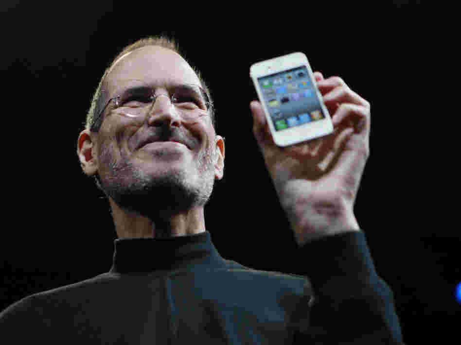 Steve Jobs,  the  now-former CEO of Apple, holds up an iPhone at the Apple Worldwide   Developers Conference in San  Francisco in June 2010. Jobs announced on  Wednesday that  he would be resigning as CEO of Apple.