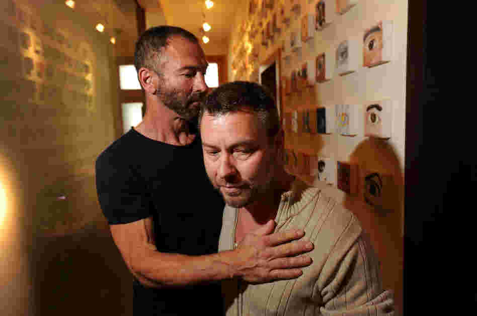 Anthony Makk (right) and husband Bradford Wells at their San Francisco home on Aug. 8. Though legally married in 2004, Makk faces deportation back to his native Australia. Anthony Makk (right) and husband Bradford Wells at their San Francisco home on Aug. 8. Though legally married in 2004, Makk faces deportation back to his native Australia.