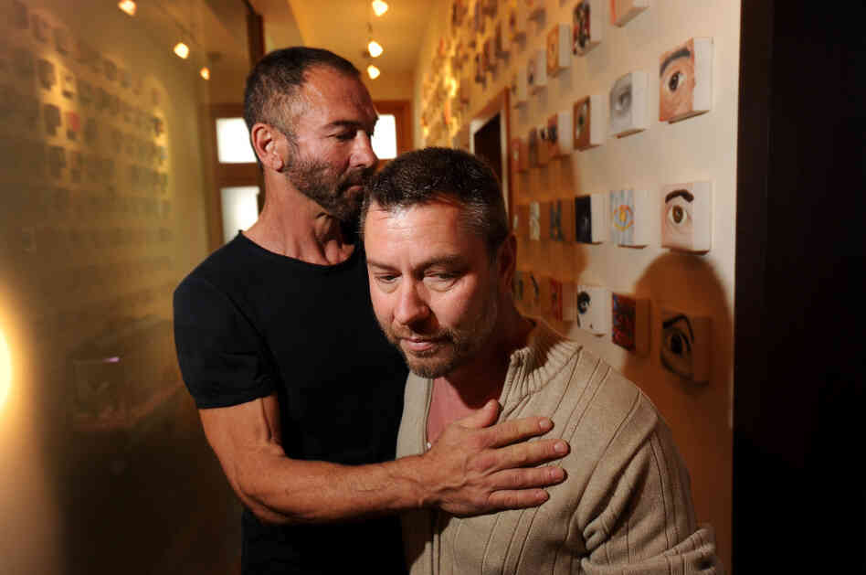 Anthony Makk (right) and husband Bradford Wells at their San Francisco home on Aug. 8. Though legally married in 2004, Makk faces deportation back to his native Australia. Anthony Makk (right) and husband Bradford Wells at their San Francisco home on Aug. 8. Though legally married in 2004, Makk faces deportation back to his native Australia.