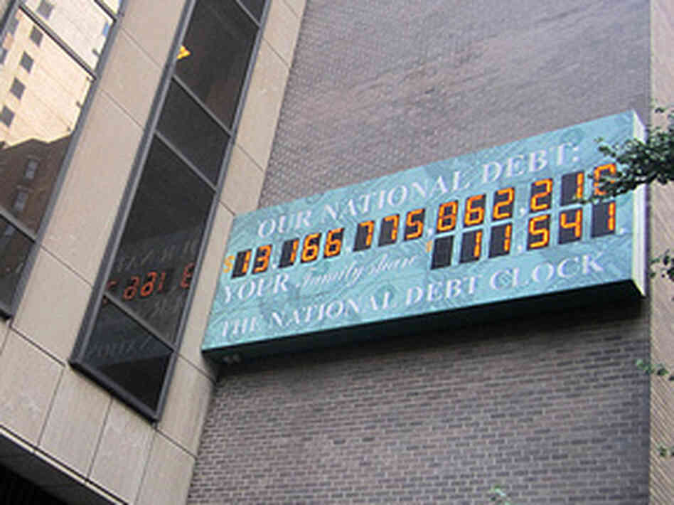 The National Debt Clock, pictured hanging in New York City in 2010, displays a live count of the United States' national debt. The National Debt Clock, pictured hanging in New York City in 2010, displays a live count of the United States' national debt.