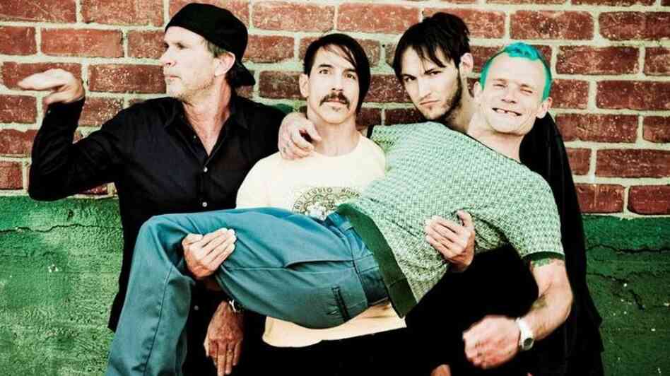 Red Hot Chili Peppers, left to right: drummer Chad Smith, lead singer Anthony Kiedis, new guitarist Josh Klinghoffer, bassist Flea.