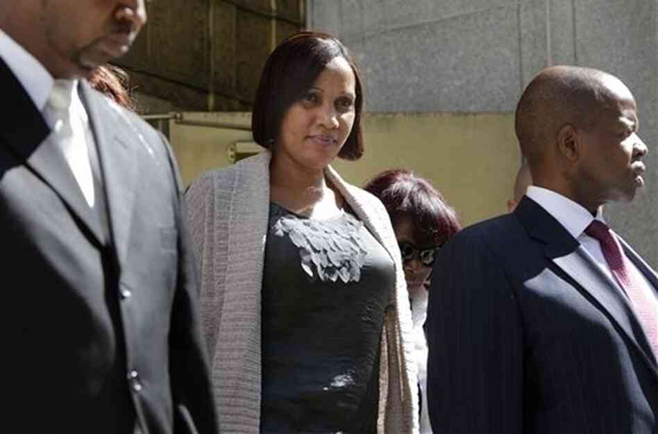 Nafissatou Diallo leaves a New York office building with her lawyer Kenneth Thompson. Nafissatou Diallo leaves a New York office building with her lawyer Kenneth Thompson.