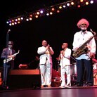 Rollins (far right) on stage at his 80th-birthday concert in New York City. Also pictured (left to right): Ornette Coleman, Christian McBride, Roy Haynes. Rollins (far right) on stage at his 80th-birthday concert in New York City. Also pictured (left to right): Ornette Coleman, Christian McBride, Roy Haynes.