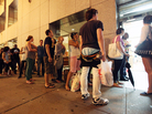People stand in line at a Trader Joe's Wine Shop in Manhattan Friday, ahead of Hurricane Irene's arrival in New York City this weekend. People stand in line at a Trader Joe's Wine Shop in Manhattan Friday, ahead of Hurricane Irene's arrival in New York City this weekend.