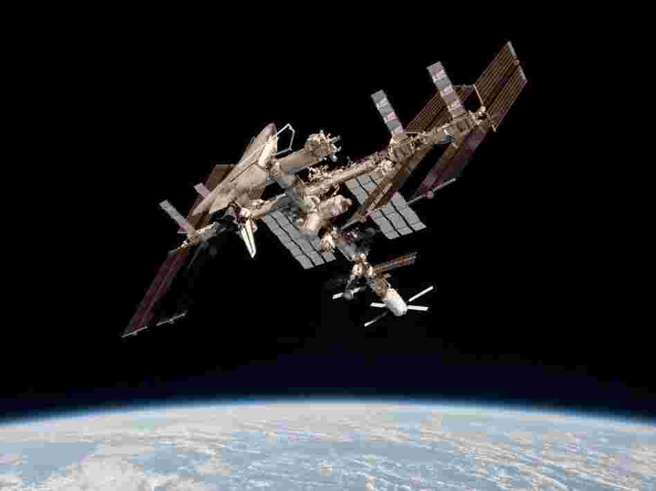 The International Space Station and the docked space shuttle Endeavour, flying at an altitude of approximately 220 miles, on May 23, 2011.