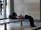 A man rests at the Trenton, N.J., train station on Monday, where some commuters were caught off guard when they found there were no trains. Damage from Hurricane Irene forced New Jersey Transit to suspend rail service. A man rests at the Trenton, N.J., train station on Monday, where some commuters were caught off guard when they found there were no trains. Damage from Hurricane Irene forced New Jersey Transit to suspend rail service.