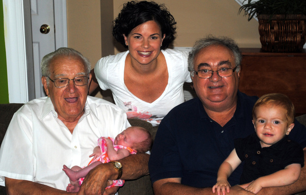 Four generations (Christy, her grandfather, father and children) gather for a snapshot.