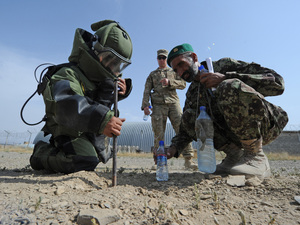 Supervised by U.S. soldiers, Afghan national army personnel participate in a training exercise simulating detonation of an IED near Camp Clark in Afghanistan's Khost province, July 6. Supervised by U.S. soldiers, Afghan national army personnel participate in a training exercise simulating detonation of an IED near Camp Clark in Afghanistan's Khost province, July 6.