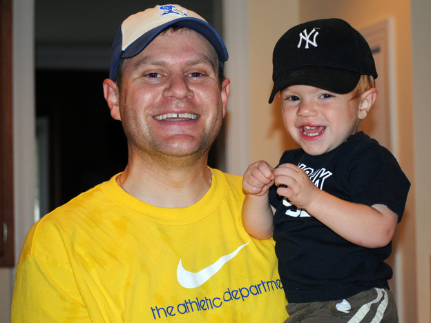 The boys in Christy's life bond in baseball caps.