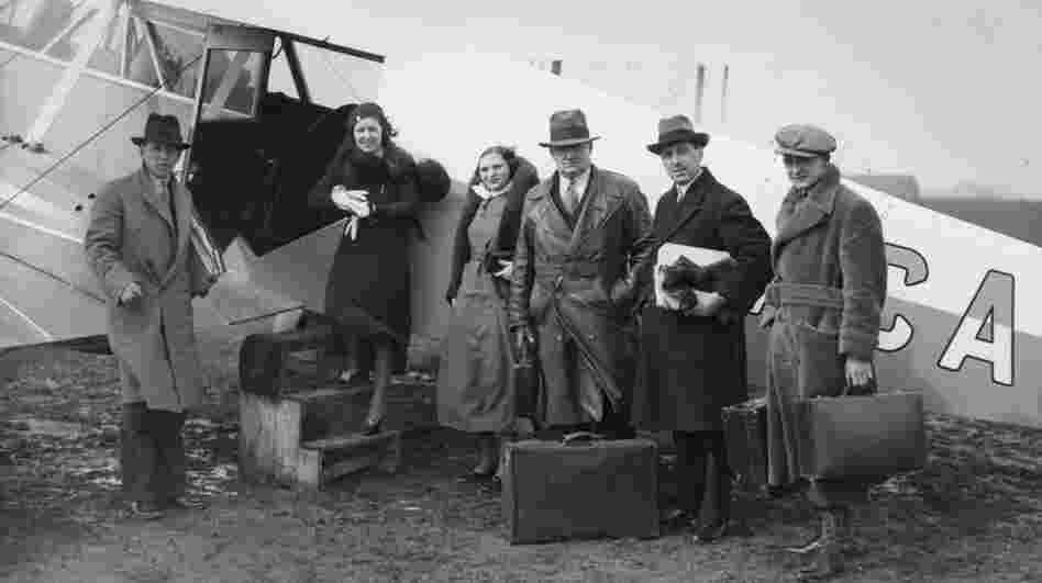 It's an age old question: What's the easiest way to board a plane? In this 1933 picture, passengers wait to board a new passenger service between London and Paris. It's an age old question: What's the easiest way to board a plane? In this 1933 picture, passengers wait to board a new passenger service between London and Paris.