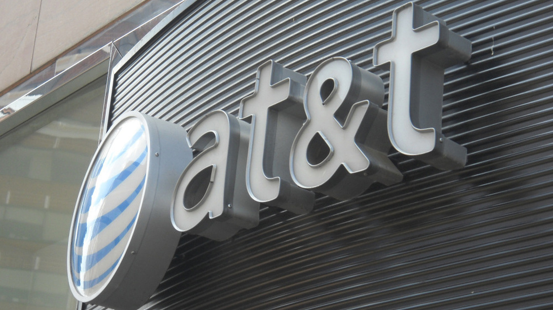This June 2, 2010, file photo shows the AT&T logo in Washington, D.C. The U.S. Justice Department will seek to block AT&T's proposed $39 billion acquisition of T-Mobile.