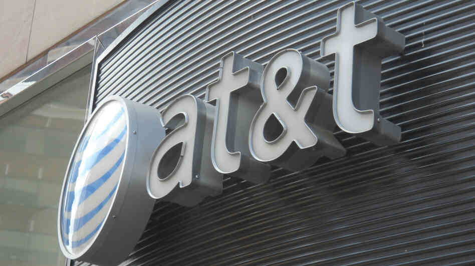 This June 2, 2010, file photo shows the AT&T logo in Washington, D.C. The U.S. Justice Department will seek to block AT&T's proposed $39 billion acquisition of T-Mobile.