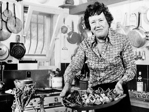 Bon Appetit: Chef Julia Child shows off a salade nicoise she prepared in the kitchen of her vacation home in southern France, in August 1978. Child remembered the first French dinner she had, back in 1948: sole with mushroom and white wine sauce, and oysters on the half shell. "I just couldn't get over it," she told Terry Gross. "I hadn't ever had that kind of food."