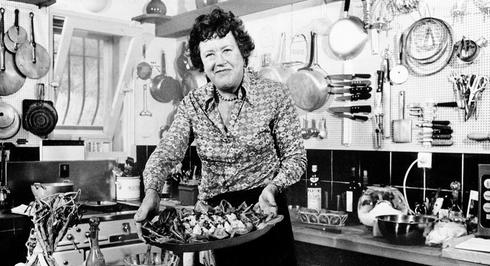Bon Appetit: Chef Julia Child shows off a salade nicoise she prepared in the kitchen of her vacation home in southern France, in August 1978. Child remembered the first French dinner she had, back in 1948: sole with mushroom and white wine sauce, and oysters on the half shell. "I just couldn't get over it," she told Terry Gross. "I hadn't ever had that kind of food."