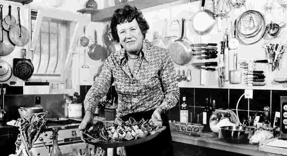 Bon Appetit: Chef Julia Child shows off a salade nicoise she prepared in the kitchen of her vacation home in southern France, in August 1978. Child remembered the first French dinner she had, back in 1948: sole with mushroom and white wine sauce, and oysters on the half shell. "I just couldn't get over it," she told Terry Gross. "I hadn't ever had that kind of food."