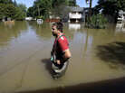 In Pompton Lakes, N.J., earlier this week, Gino Borova stood in the driveway of his house — which was flooded by water from the Ramapo River. In Pompton Lakes, N.J., earlier this week, Gino Borova stood in the driveway of his house — which was flooded by water from the Ramapo River.