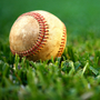 A baseball in the grass. A baseball in the grass.