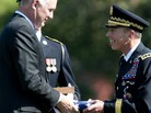 Deputy Defense Secretary William Lynn (left) presents Gen. David Petraeus with an American flag at his retirement ceremony after 37 years in the Army, in Arlington, Va., on Wednesday. Petraeus will now lead the CIA. Deputy Defense Secretary William Lynn (left) presents Gen. David Petraeus with an American flag at his retirement ceremony after 37 years in the Army, in Arlington, Va., on Wednesday. Petraeus will now lead the CIA.
