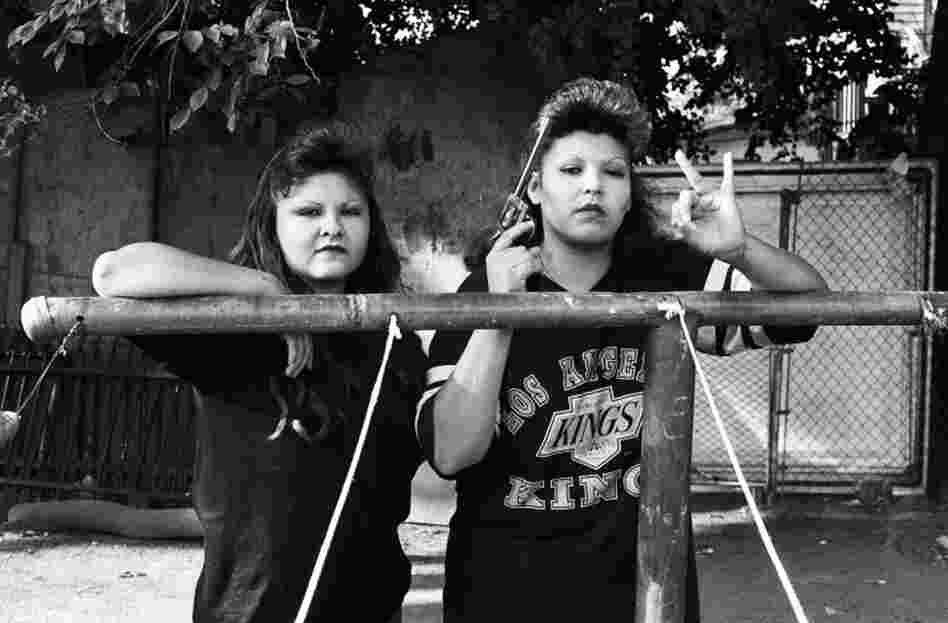 BooBoo (right) flashes a Playboys gang hand sign, 1993. BooBoo (right) flashes a Playboys gang hand sign, 1993.