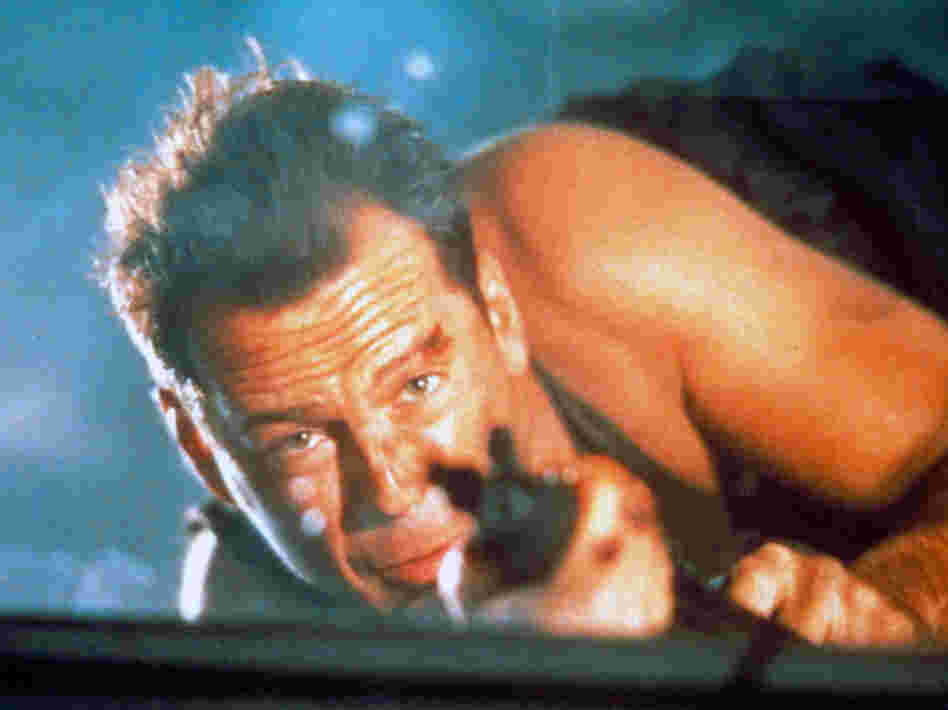 Bruce Willis as John McClane in the 1988 film Die Hard.
