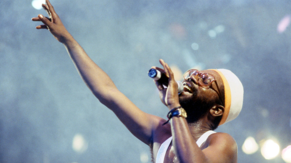 Beres Hammond onstage at Reggae Sunsplash in August of 1993. On Reggae Goes Country he sings "He Stopped Loving Her Today," most famously recorded by George Jones.