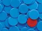 Blue game chips out number one red game chip. Blue game chips out number one red game chip.