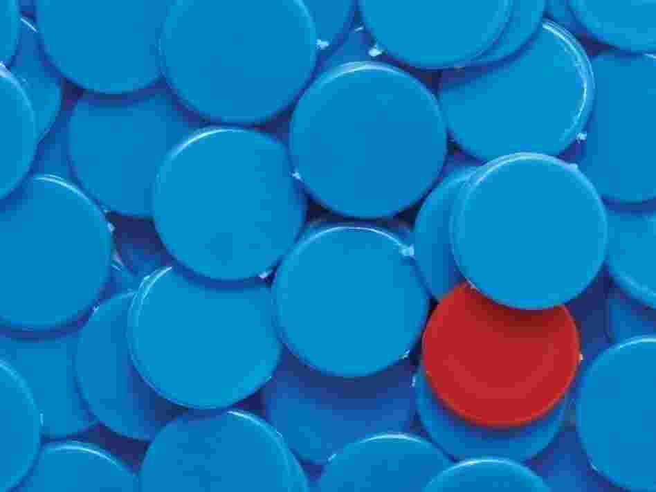 Blue game chips out number one red game chip. Blue game chips out number one red game chip.