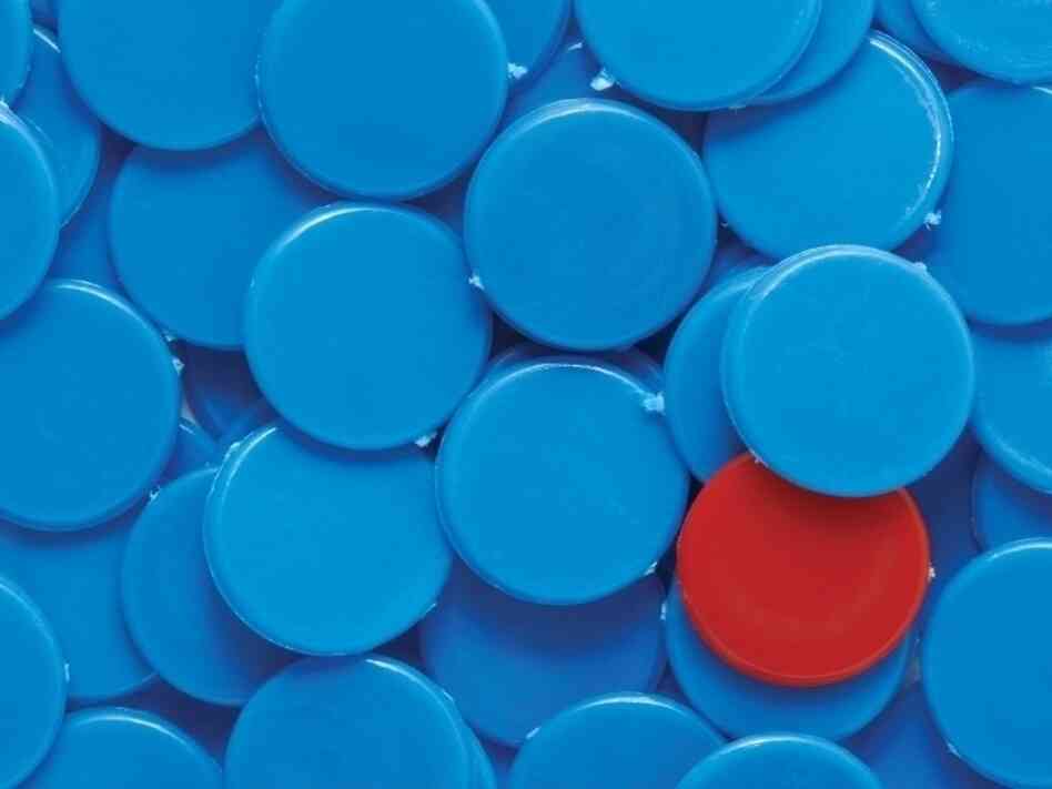Blue game chips out number one red game chip. Blue game chips out number one red game chip.
