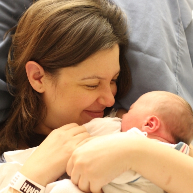 Barrie Hardymon with her newborn son, Hank, in March.