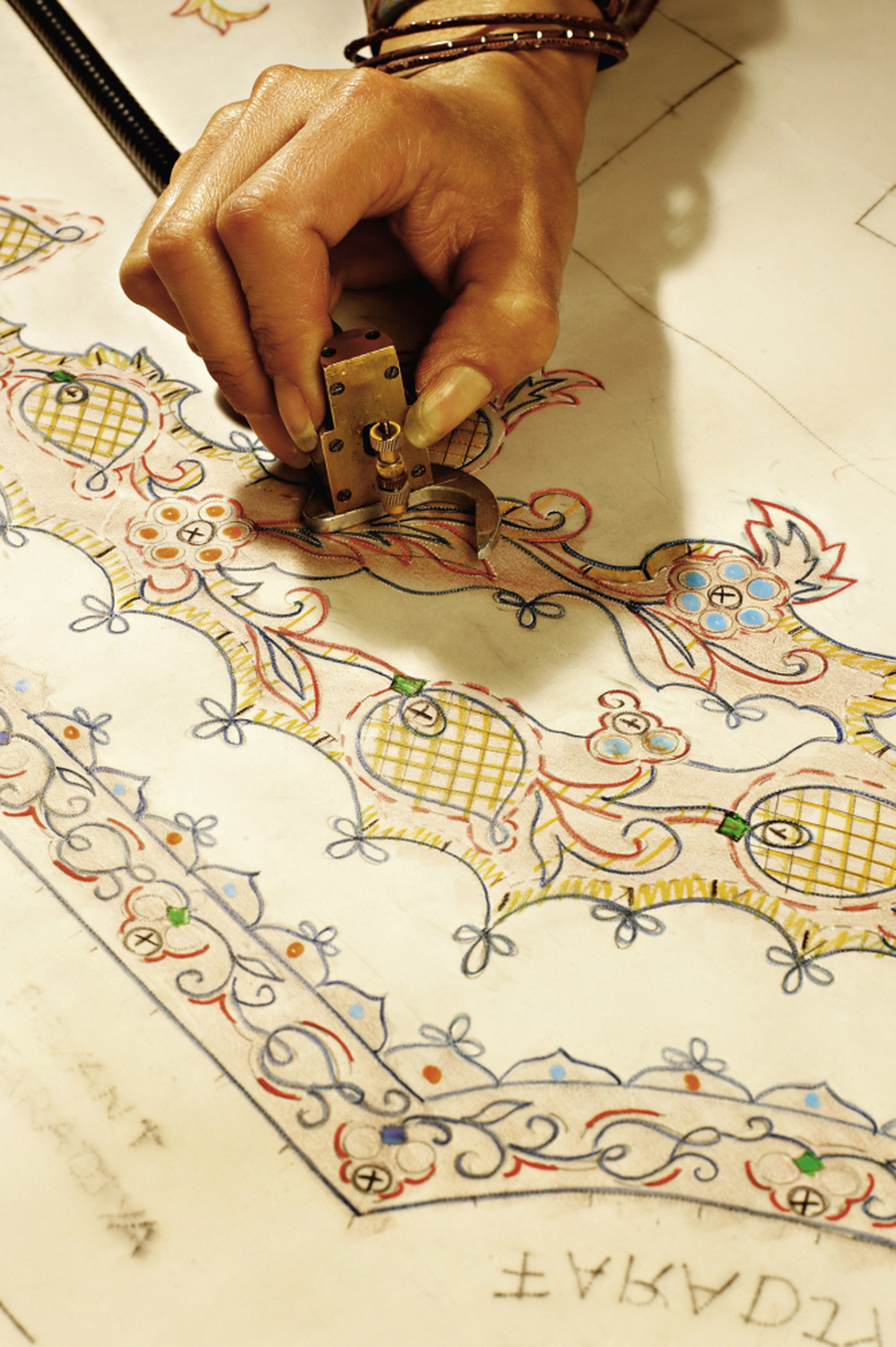 Petites mains — little hands, as they are affectionately called — are behind all of the studio's creations. Designs are carefully drawn out before the sewing begins.