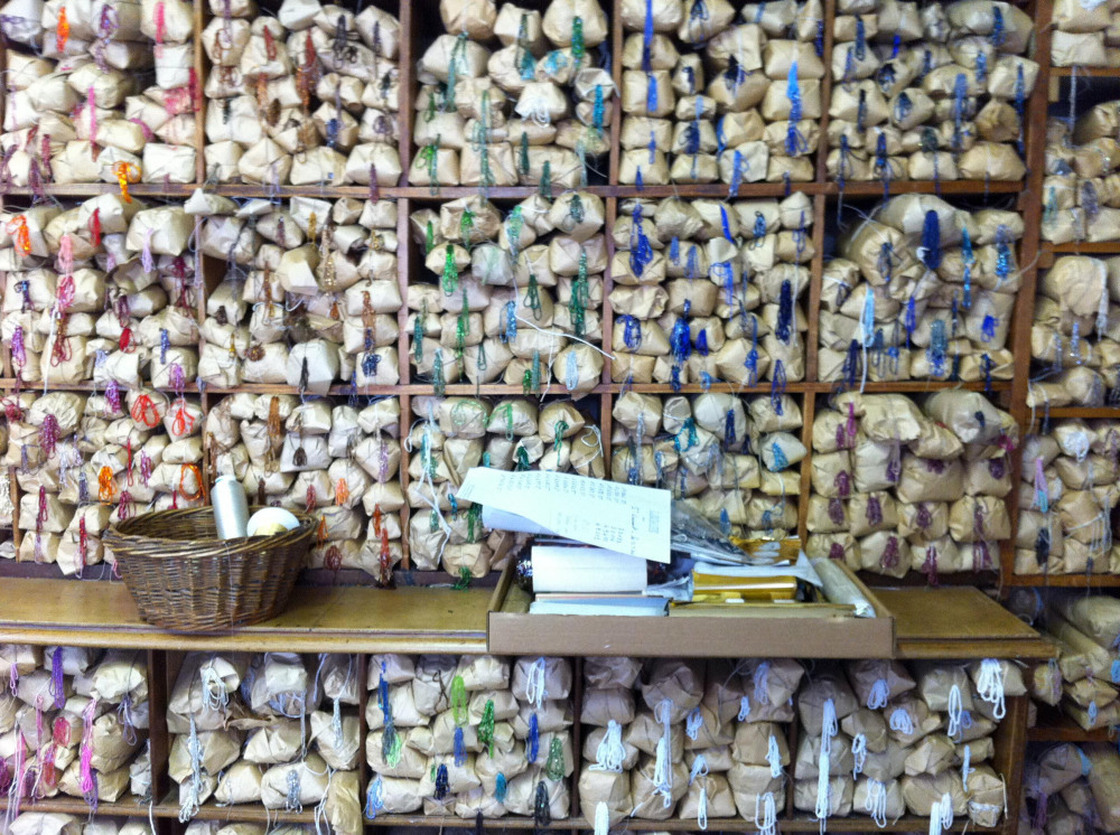 Beads of every imaginable color are organized in a rainbow of packets on the walls of the Lesage studio. Click here to see them up close.