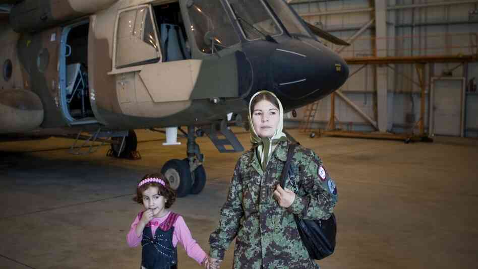 Col. Latifa Nabizada, the only female pilot in Afghanistan, flies her helicopter to some of the most dangerous parts of the country. Her 5-year-old daughter, Malalai, is often with her in the cockpit. Col. Latifa Nabizada, the only female pilot in Afghanistan, flies her helicopter to some of the most dangerous parts of the country. Her 5-year-old daughter, Malalai, is often with her in the cockpit.
