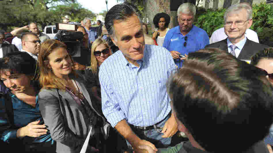 Republican presidential candidate Mitt Romney meets with supporters during the grand opening of his Florida campaign headquarters in Tampa on Friday. Republican presidential candidate Mitt Romney meets with supporters during the grand opening of his Florida campaign headquarters in Tampa on Friday.