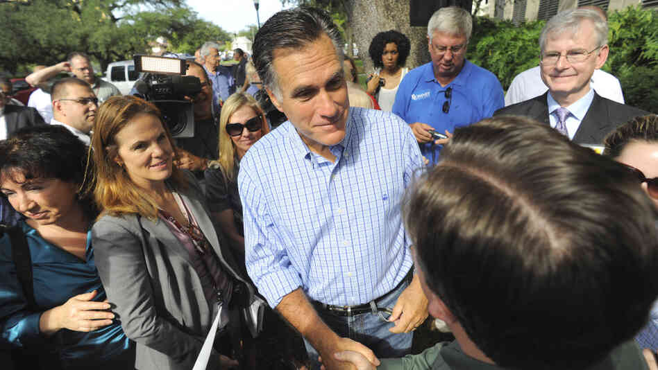 Republican presidential candidate Mitt Romney meets with supporters during the grand opening of his Florida campaign headquarters in Tampa on Friday. Republican presidential candidate Mitt Romney meets with supporters during the grand opening of his Florida campaign headquarters in Tampa on Friday.