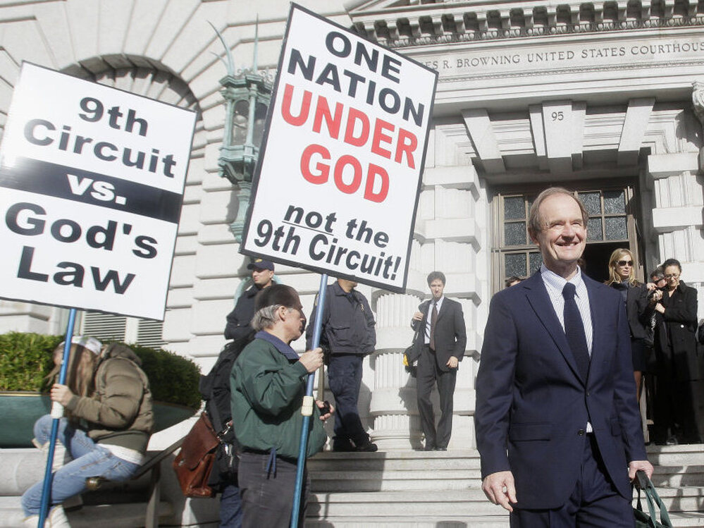 Co-lead counsel of the legal team challenging California's same-sex marriage ban, David Boies, right, walks past opponents of same-sex marriage as he leaves after a hearing in the Ninth Circuit Court of Appeals on Dec. 6, 2010, in San Francisco. A trial court judge overturned the measure as a violation of gay Californians' civil rights in August.