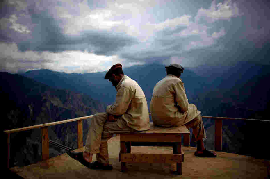 Afghan Security Guards look over the Kunar river valley.