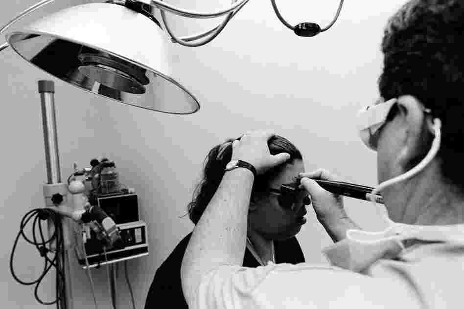 BooBoo receives the first laser treatment to remove her visible tattoos, 1998