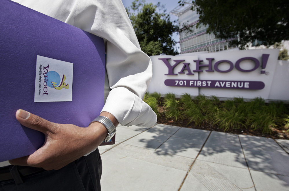 An employee leaves Yahoo headquarters in Sunnyvale, Calif. The company fired its chief executive officer earlier this week.