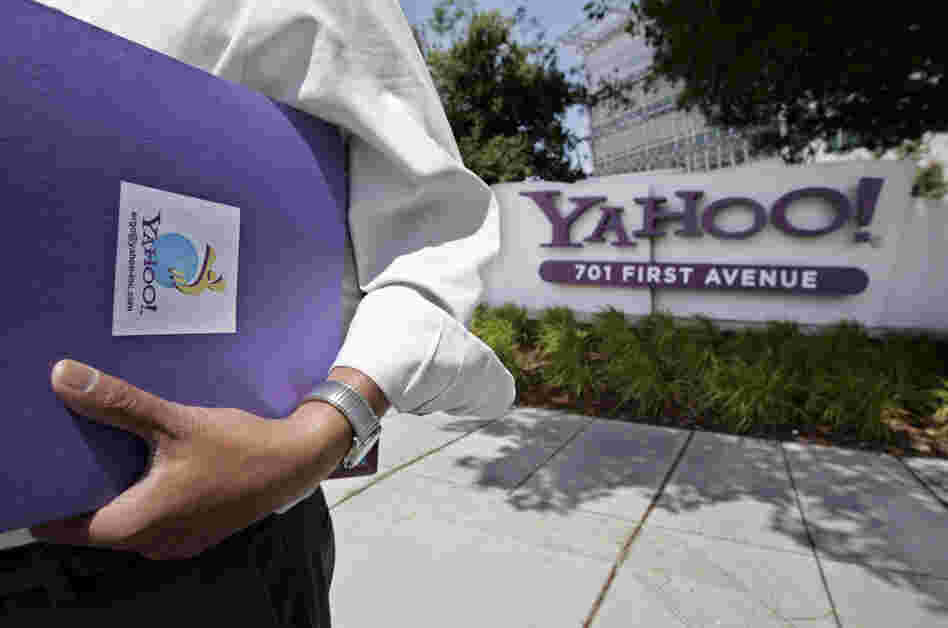 An employee leaves Yahoo headquarters in Sunnyvale, Calif. The company fired its chief executive officer earlier this week.