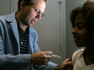 Dr. Donald Brown inoculates Kelly Kent with Gardasil, one brand of vaccine against the human papillomavirus, in his Chicago office in 2006. Dr. Donald Brown inoculates Kelly Kent with Gardasil, one brand of vaccine against the human papillomavirus, in his Chicago office in 2006.