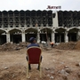 A Pakistani security guard sits on a chair amid the wreckage of the Marriott Hotel in Islamabad on Sept. 22, 2008, two days after a suicide bombing at the hotel. A Pakistani security guard sits on a chair amid the wreckage of the Marriott Hotel in Islamabad on Sept. 22, 2008, two days after a suicide bombing at the hotel.
